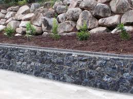 Boulder walls and bobcat hire offer a personalized service in constructing boulder retaining walls for domestic and commercial properties. Retainer Walls And Stairs Gardenmakers Landscaping