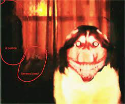 Maybe you would like to learn more about one of these? Some Things I Noticed In The Smile Dog Image I Lit Up The Image A Little Bit And You Can See A Sillhouette Of A Person And A Severed Arm Or A