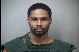 Man charged with threatening to beat woman with table leg