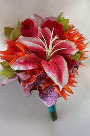 Few arrangements receive the care and attention that is given to the bridal bouquet. Destination Wedding Flowers Stargazer Tropical Wedding Flowers Part 1 Silk Wedding Flowers And Bouquets Online Love Is Blooming