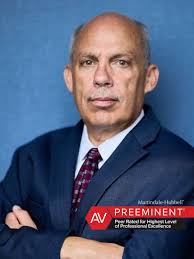 Our Team — Law Offices of Benvenuto & Gaujean