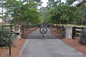 With the build of the new carriage house (happening within the next eight weeks), we'll also be installing a 300 foot driveway. Custom Gates And Fences Seegars Fence Company