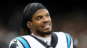 The Panthers have stated that they "don't know if Cam is retired yet" which  is why they don't have any pictures of him. The Panthers might be subject  to fines or penalties