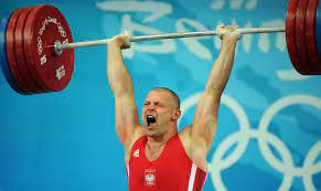 Podnoszenie ciężarów obecne było już w programie pierwszych nowożytnych igrzysk olimpijskich w atenach w 1896. Szymon Kolecki Mistrzem Olimpijskim Doping U Iljina Podnoszenie Ciezarow