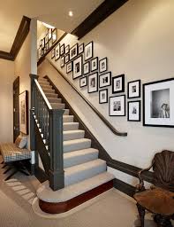 Hang photos with picture hanging strips. Tips To Create A Gallery Wall In A Stairwell Top Dreamer