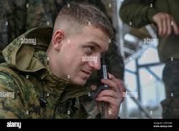 U.S. Marine Corps Cpl. Samuel Knowles, a radio operator assigned to the  26th Marine Expeditionary Unit, conducts a communications check at Camp  Lejeune, North Carolina, Jan. 27, 2021. Communication is an essential