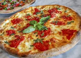 This Simple Classic Margherita Pizza Is Topped With The Italian Flavors You Love Bosspizza Margherita Pizza Fire Pizza Italian Recipes Authentic