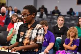 Teacher and students who developed Kindness All Around recognized by school  board,