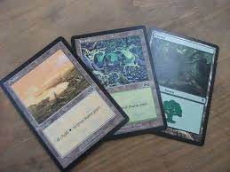 The first thing that you want to do when you are making your magic the gathering deck is to find all of the cards that you really want to have in your deck. Make Nerdy Coasters With Magic The Gathering Cards Offbeat Home Life Magic The Gathering Crafts Card Magic Tricks Magic Crafts