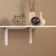 A large range of floating shelf wall brackets which can be used to support custom manufactured concealed bracket floating shelves. Everbilt 11 9 In X 7 9 White Magnum Shelf Bracket Eb 0099 12wt The Home Depot Decorative Shelf Brackets Shelf Brackets Shelves