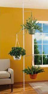create added space while organizing and removing the clutter of potted plants with an indoor plant pole this sprin hanging lights
