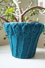 Use this pattern to make hangers for both your crocheted potted plants and for real plants in pots. Plant Pot Cosy Free Knitting Pattern