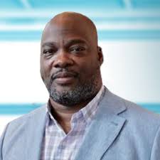 Information Technology Director Anthony Moore Makes a Big Impact Teaching  Tech to Young Men