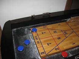 It is played on an outdoor court measuring 52 feet long by 10 feet wide, although there are different dimensions available on new portable and indoor courts. Table Shuffleboard Wikipedia