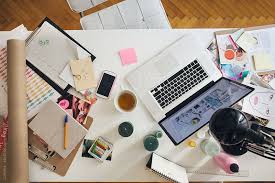 Overhead View Of The Desk Of A Modern Businesswoman Images On The Desk Are The Property Of Lumina Images And Can Be L Messy Desk Declutter Your Life Declutter