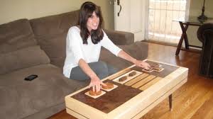 The table (which is 42″ x 18.25″ x 18″. Nes Controller Coffee Table I Want One