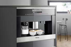 In chef monica galetti's kitchen, integrated miele appliances in obsidian black enhance the sleek, industrial look of the space. Kitchen Experience