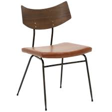 Nuevo soli dining chair is a trim, compact, stacking chair that adds style and functionality to any room. Vega Soli Dining Chair Tan Leather Oak Barker Stonehouse