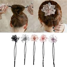 Clip her hair securely into place using two beautiful flower hair accessories. Amazon Com Anbibo Magic Hair Bun Maker 5pcs Pearl Flower Donuts Twist Headband French Bud Headwear Diy Hairstyle Tool 1a Beauty