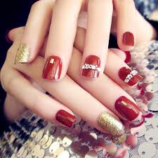 Build your nails with acrylic gel and choose two nail polishes, in red and golden colors. Gifts 24pcs Red Gold Short False Nails With Stickers Acrylic Nail Art Tools Shopee Malaysia