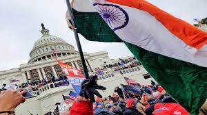 (photo by saul loeb / afp). Delhi Police File Case Against Man Who Waved Tricolour During Protests At Us Capitol