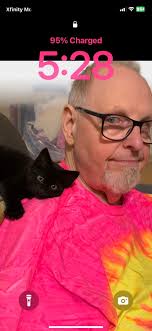 Hi all! I just wanted to introduce myself and share a photo I took. This my  kitten, Ebony Snow!! She's still a baby. She was born