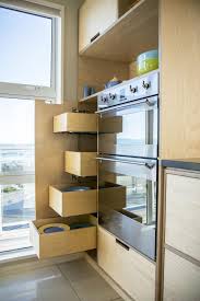 Crisp Simple And Modern Plywood Kitchen Oiled Birch Plywood And Absolute Black Honed Granite Birch Kitchen Cabinets Kitchen Cabinet Design Blue Kitchen Decor