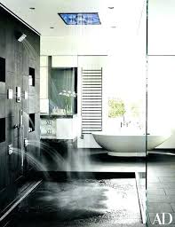 Clean lighting and bright bath is well supported by white marble and a lot of glass work. Modern Master Bathroom Design