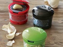 The Fastest Way To Slice Dice Grate Mince And Store Garlic Is By Using The Sur La Table Slice And Dice Kitchen Gadgets Cooking Gadgets Cool Kitchen Gadgets