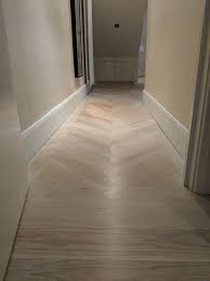 You Don T Have To Stick To The Same Flooring All Throughout Your House Here We Fitted A Light Chevron Floor Stairs Cladding Hardwood Floors Floor Installation