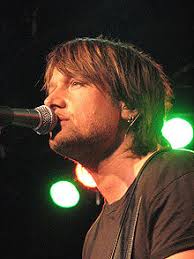 This particular country singer has had a string of hit singles in recent years but many people don't realize that his life as a country music artist what is the name of this australian country singer? Keith Urban Wikipedia