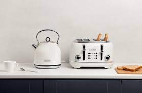 Almost every person starts the day with a cup of coffee or tea along with some bread or similar items. Heritage White 4 Slice Toaster Kettle And Toaster Set Kettle And Toaster White Toaster