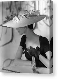 a model wearing a hattie carnegie hat canvas print canvas art by horst p horst vintage glamour vintage vogue hats vintage