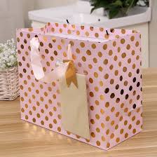 ribbon handle with tissue paper gift bag