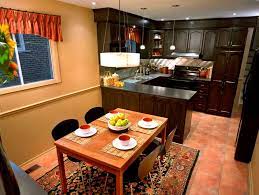 The color is similar to the wall and granite countertops. Peninsula Kitchens Hgtv