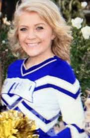 Cheerleader charged in homeless man's murder