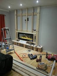 You can't use a real fireplace in your flat apartment as it needs logs to heat up flames and the smokes. This Homemade Fireplace Turned A Boring Wall Into The Best Part Of The House Viralnova