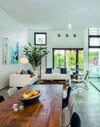 Open Plan Living Dining And Kitchen Areas On The Second Storey Extend Out To A L Open Plan Kitchen Living Room Living Room Kitchen Sectional Living Room Decor