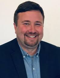 Coos County native takes helm of North Bend Farmers Insurance agency