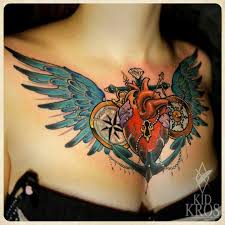 Center Of Chest Tattoo Of Heart Wings Anchor Chest Tattoos For Women Chest Piece Tattoos Cool Tattoos