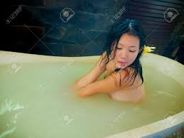 Acrylic and composite tubs holly rickert, a bath designer based in. Young Beautiful And Happy Relaxed Asian Chinese Woman Enjoying Stock Photo Picture And Royalty Free Image Image 113501710