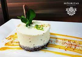 Fit the end of a piping bag with an open star tip and pipe a swirl at the base of each slice of cheesecake. Coconut White Chocolate Cheesecake Picture Of Senoritas Lodz Tripadvisor