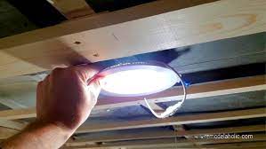 Tighten the screws with a screwdriver as needed to ensure the light fixture is secure and flush against the ceiling. Remodelaholic Recessed Light Fixtures For A Low Ceiling