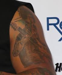 Florida georgia line's brian kelley already has seven tattoos and musical partner tyler hubbard has nine. Flo Rida S 11 Tattoos Their Meanings Body Art Guru