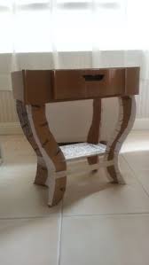I've been pretty busy moving into my new apartment. 8 Diy Cardboard Coffee Table Ideas Diy Cardboard Coffee Table Cardboard