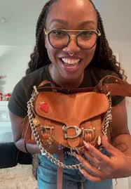 Explore the Coach Western Tabby in Burnished Amber