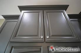 Distressing is a method of visually aging wood by causing intentional damage to the surface with a variety of instruments. Painted Cabinet Finishes And Variations Cabinets Com