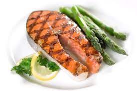 I'm going to roast salmon in the oven with lemon, a bit of dill, and a bit of butter (i do this dish well!). Salmon Steaks Elegant Dinner Party Menu