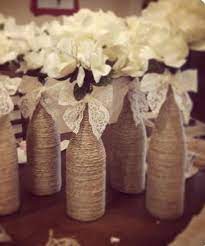 10 Wine Bottle Centerpieces For Your Wedding Wine Bottle Centerpieces Wedding Wine Bottles Bottle Centerpieces