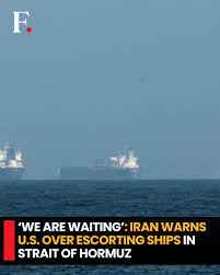 FirstpostNews: Iran's Revolutionary Guards said that they are “waiting” for  the US to escort ships out of the Strait of Hormuz, the key channel for  trade that has been choked off due